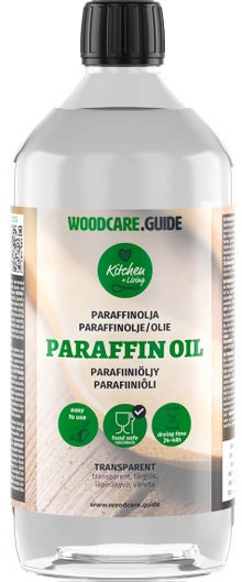 Huile de paraffine Woodcare Guide en bouteille de 1 litre.